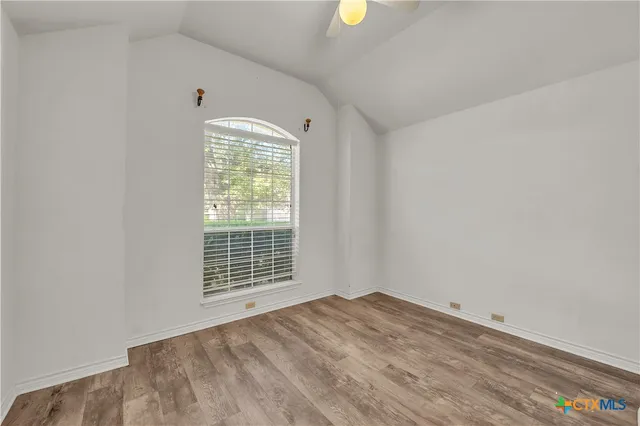 a view of a bedroom with a window