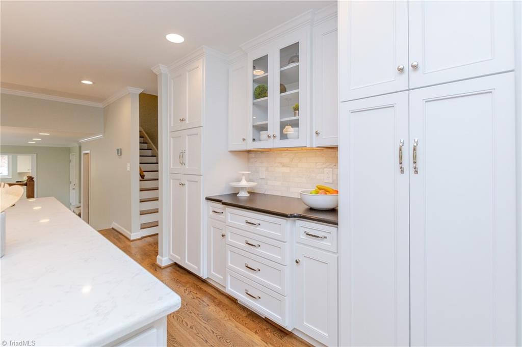 831 Trollinger Road Asheboro, NC 27203 - Photo 20 of 50 Pantry and hidden microwave storage, pull-out shelving.