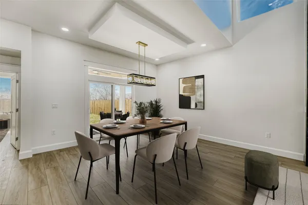 a kitchen with a stove kitchen island and stainless steel appliances