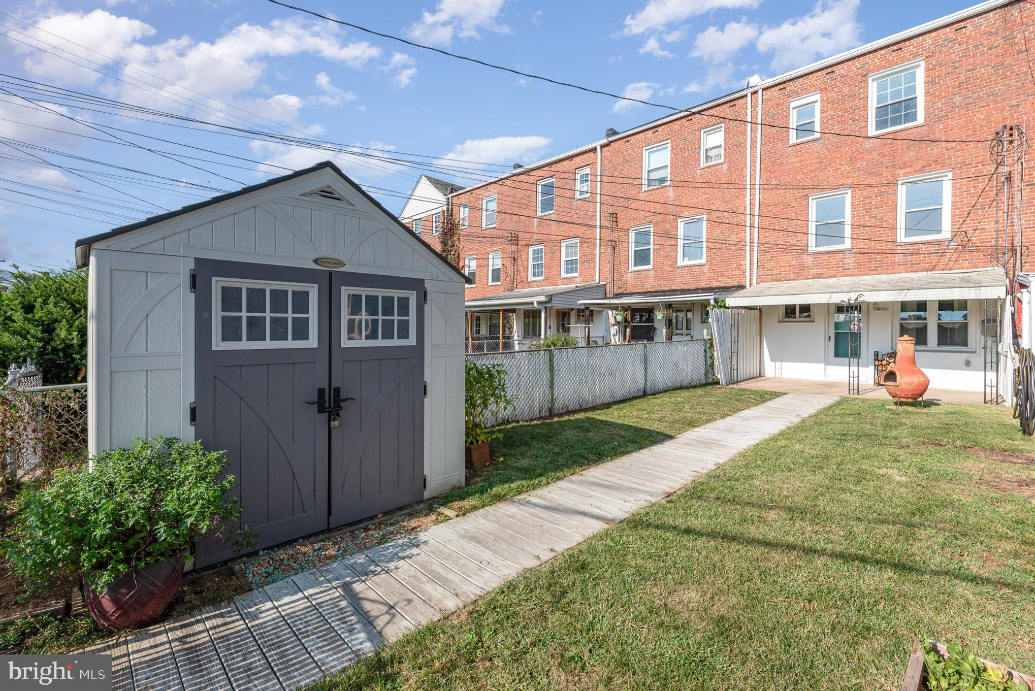 1905 Searles Road Dundalk, MD 21222 - Photo 24 of 26 Backyard with Shed & Boardwalk leading to Parking