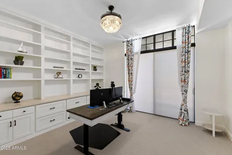 a living room with cabinets