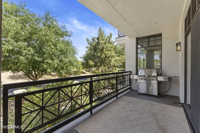 a view of a room with a table and chairs