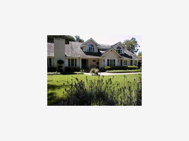 a black and white photo of a house