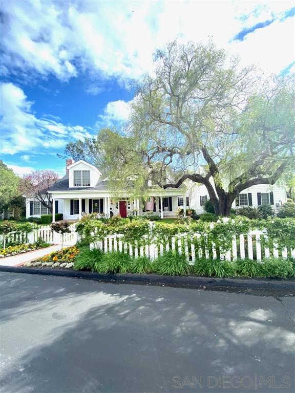 2365 Jennifer Lane Encinitas, CA 92024 - Photo 1 of 25 a front view of a house with a garden