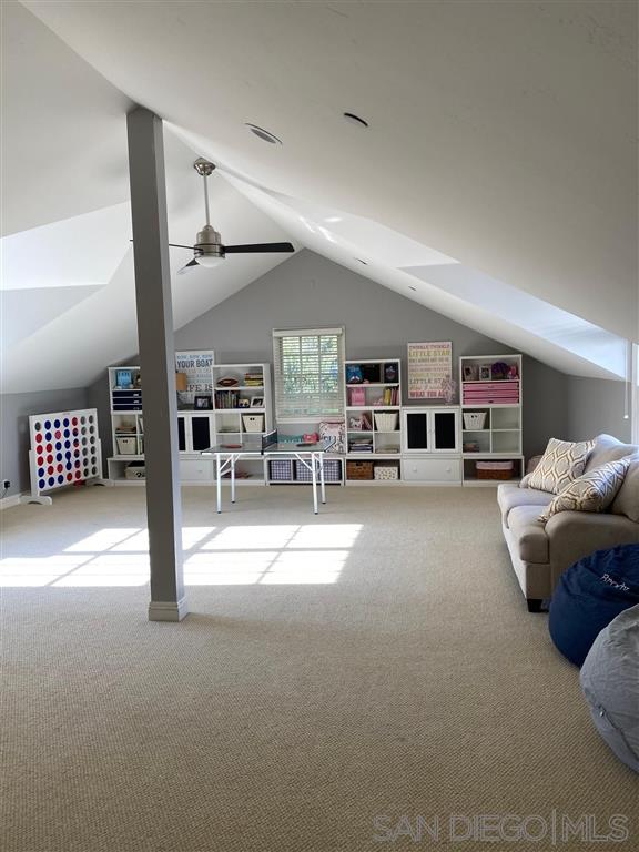 2365 Jennifer Lane Encinitas, CA 92024 - Photo 18 of 25 a living room with furniture and a table