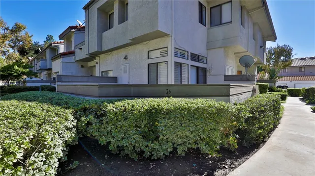 a view of a house with a garden