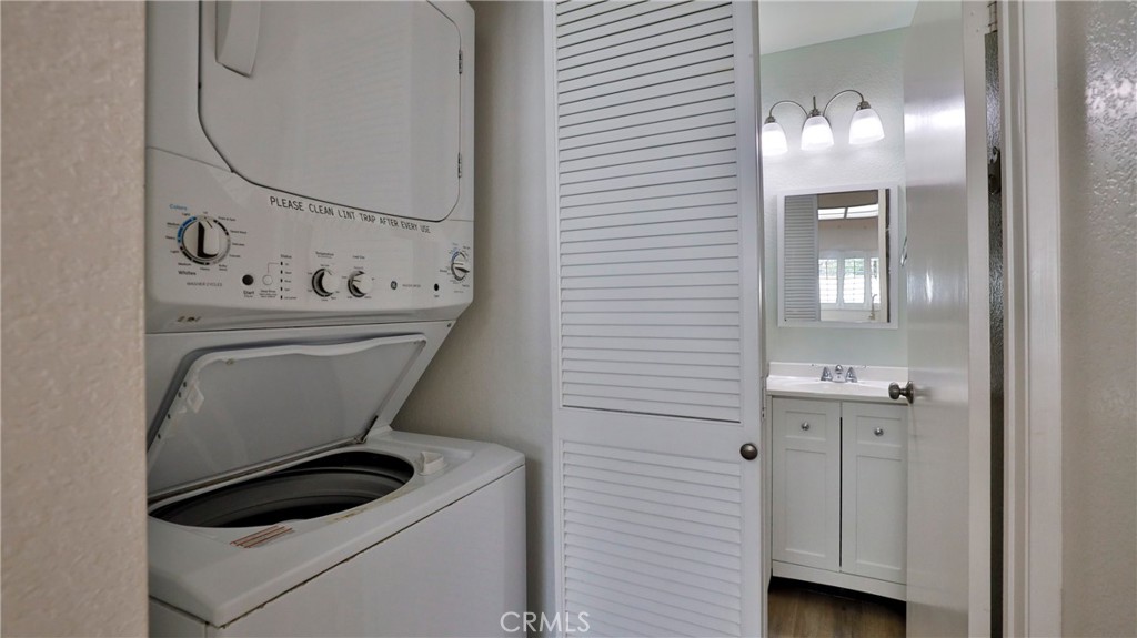 26 Willowcrest Lane Phillips Ranch, CA 91766 - Photo 13 of 39 a bathroom with a sink a toilet and mirror