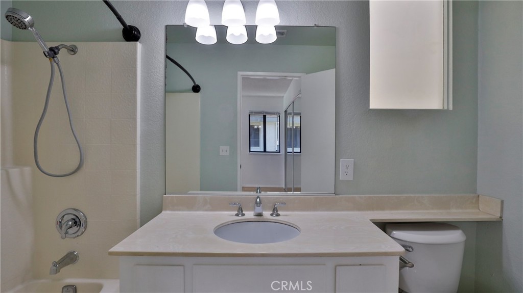 26 Willowcrest Lane Phillips Ranch, CA 91766 - Photo 18 of 39 a bathroom with a sink and a mirror