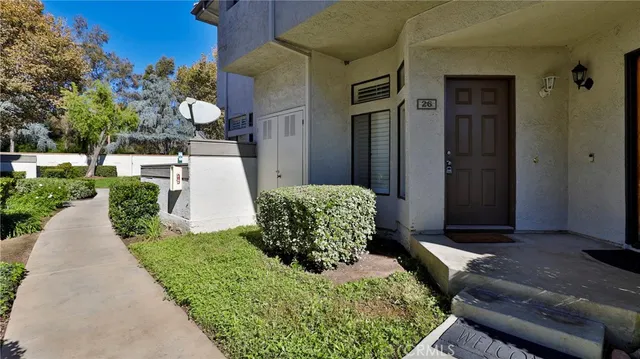 a view of a back yard of the house