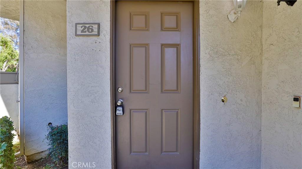 26 Willowcrest Lane Phillips Ranch, CA 91766 - Photo 3 of 39 a view of a hallway with a elevator