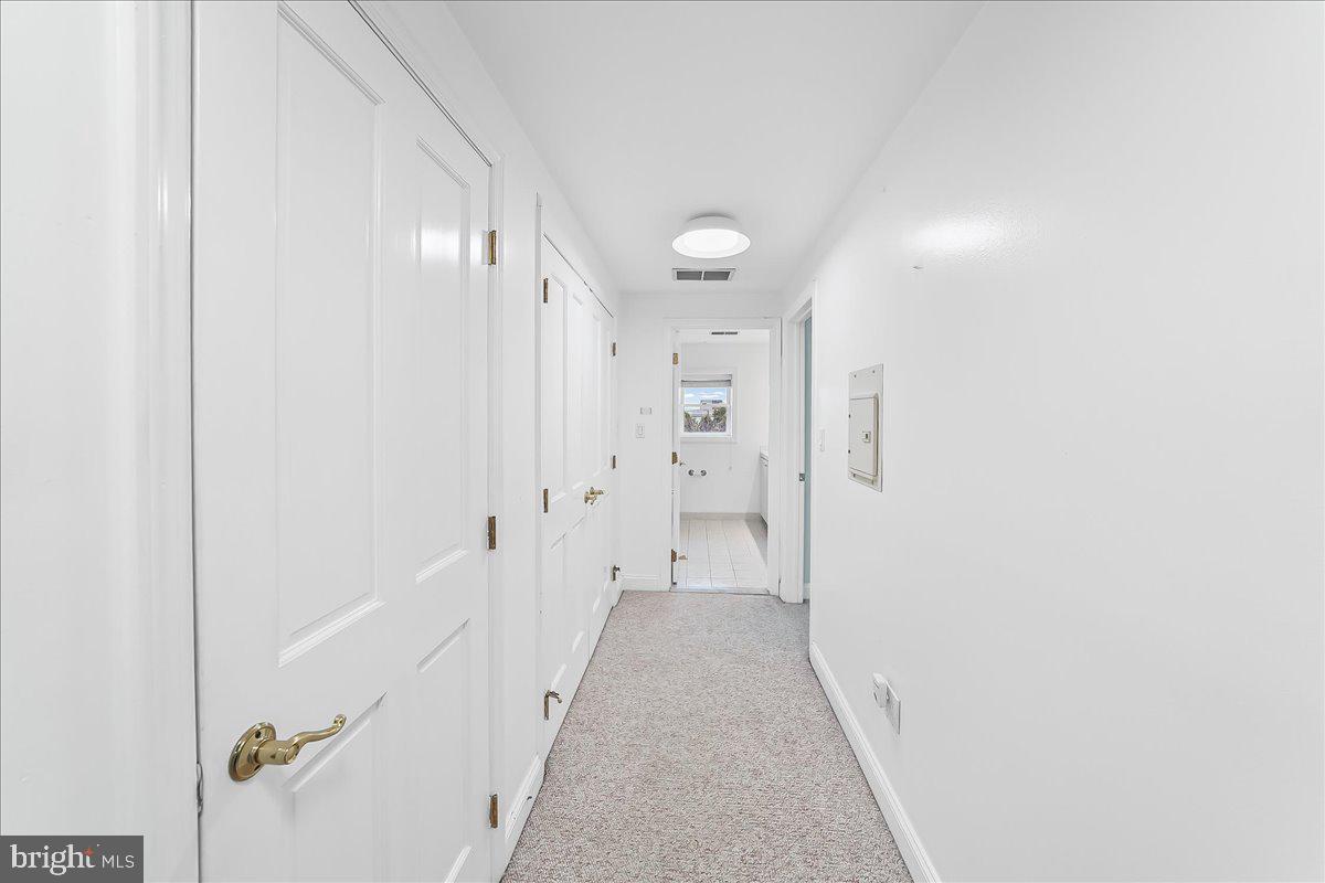 658 East Leamy Avenue Springfield, PA 19064 - Photo 20 of 36 Hallway with closet to attic as well as storage