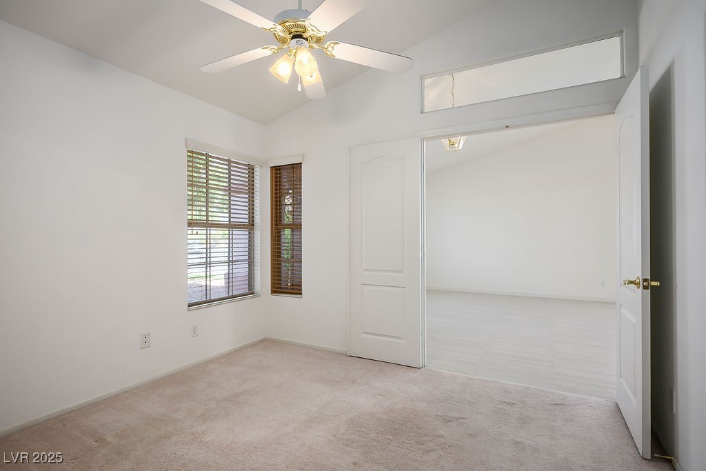1812 Jack Rabbit Way Las Vegas, NV 89128 - Photo 23 of 44 Bedroom 1 featuring a light colored carpet, and ceiling fan