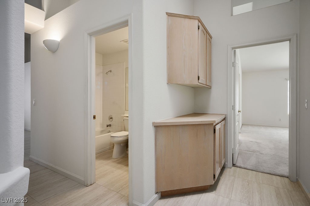 1812 Jack Rabbit Way Las Vegas, NV 89128 - Photo 25 of 44 Hallway towards the primary bedroom