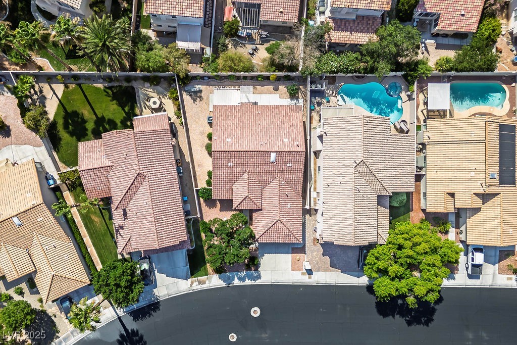 1812 Jack Rabbit Way Las Vegas, NV 89128 - Photo 41 of 44 Aerial perspective of suburban area with a pool area
