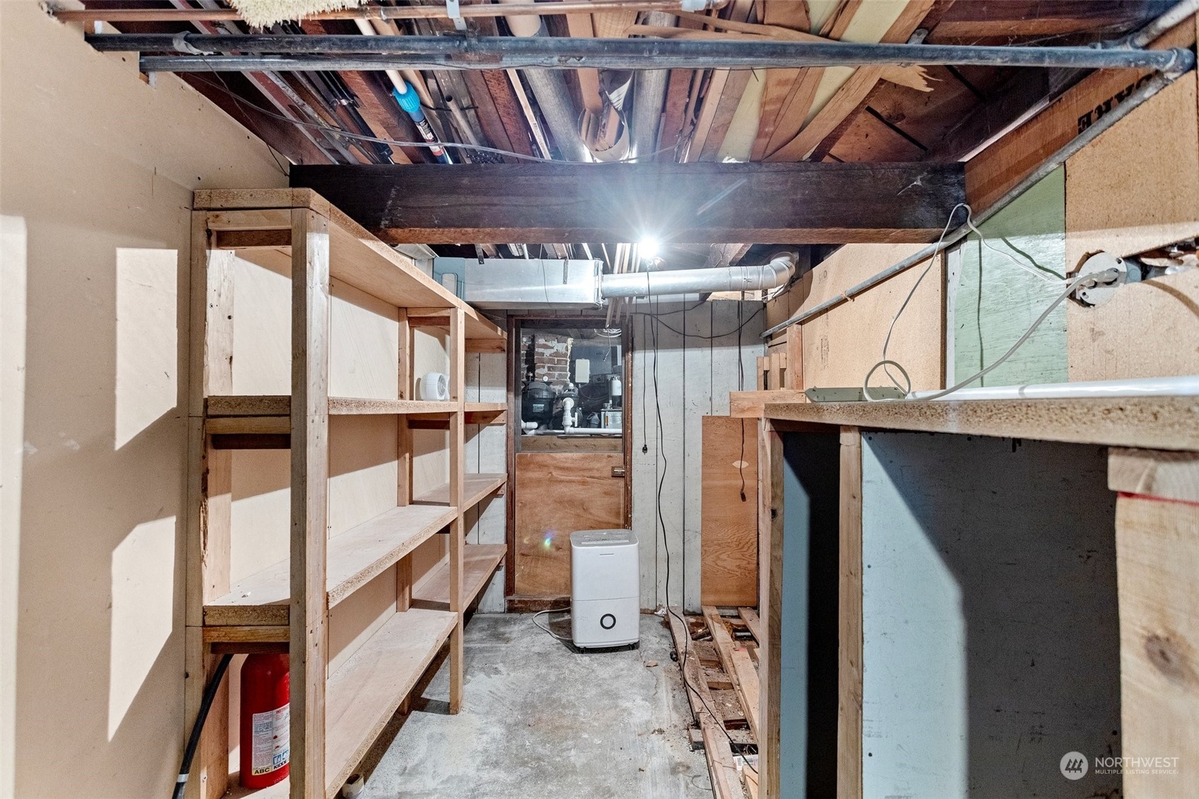 4228 Eastern Avenue North Seattle, WA 98103 - Photo 21 of 27 a view of an empty room with wooden floor