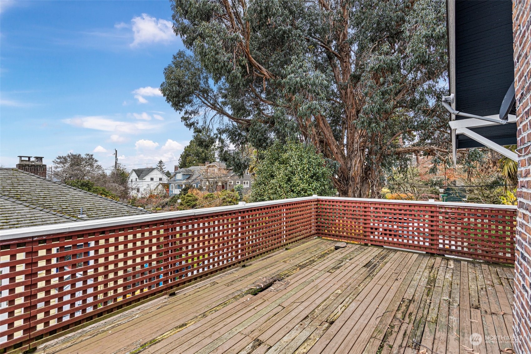 4228 Eastern Avenue North Seattle, WA 98103 - Photo 24 of 27 a view of balcony with wooden floor and fence