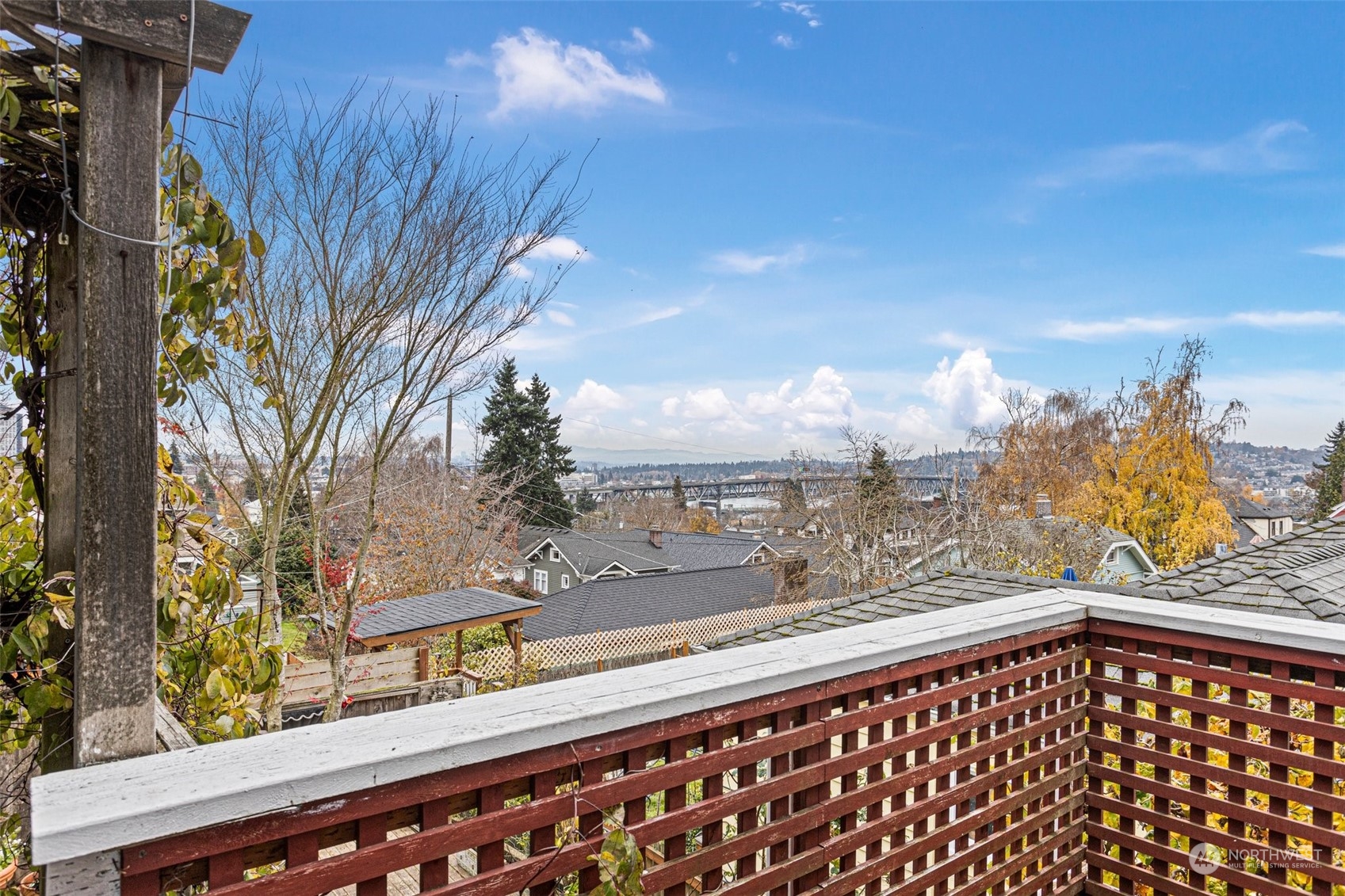 4228 Eastern Avenue North Seattle, WA 98103 - Photo 25 of 27 a view of a balcony with wooden floor and fence