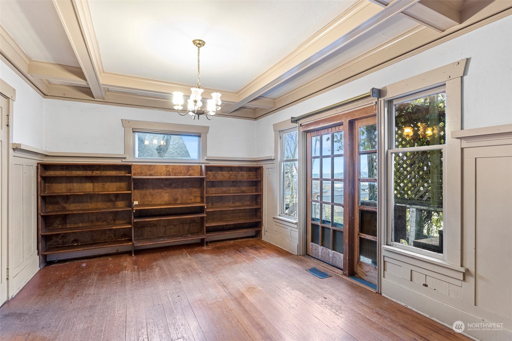 4228 Eastern Avenue North Seattle, WA 98103 - Photo 6 of 27 a view of a room with wooden floor and windows