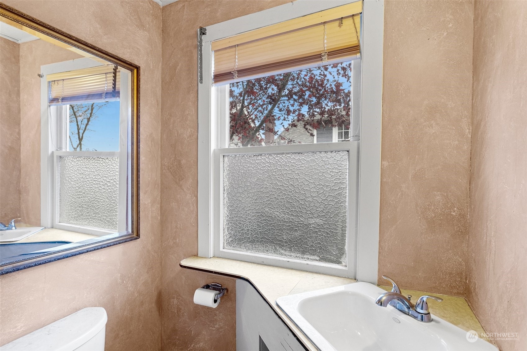 4228 Eastern Avenue North Seattle, WA 98103 - Photo 8 of 27 a bathroom with a sink and a window