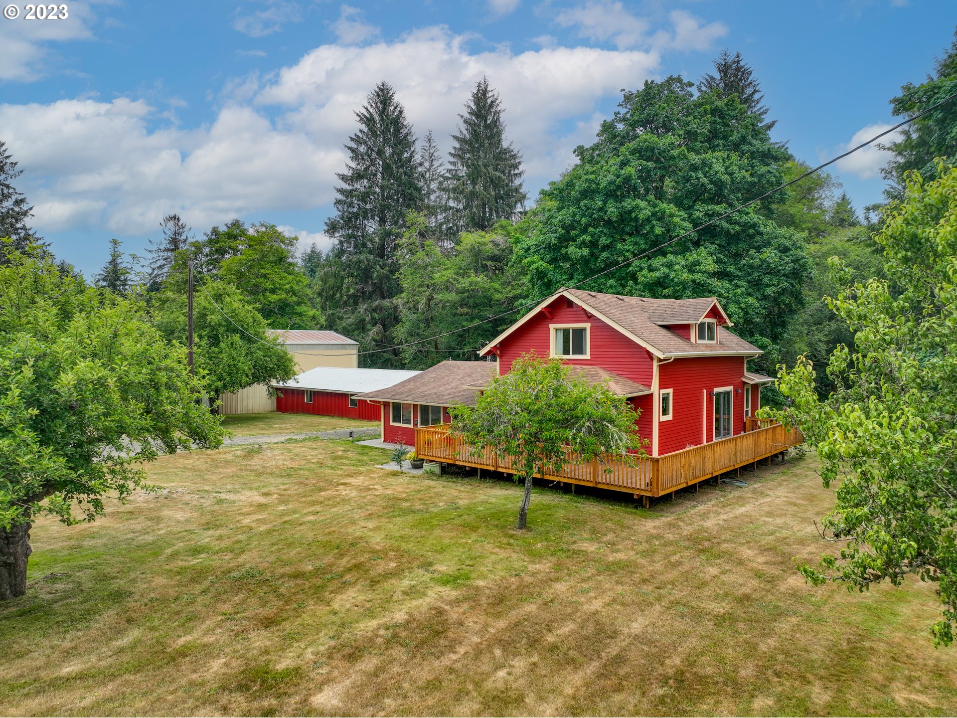 92357 Maki Road Astoria, OR 97103 - Photo 1 of 41 a house with trees in front of it