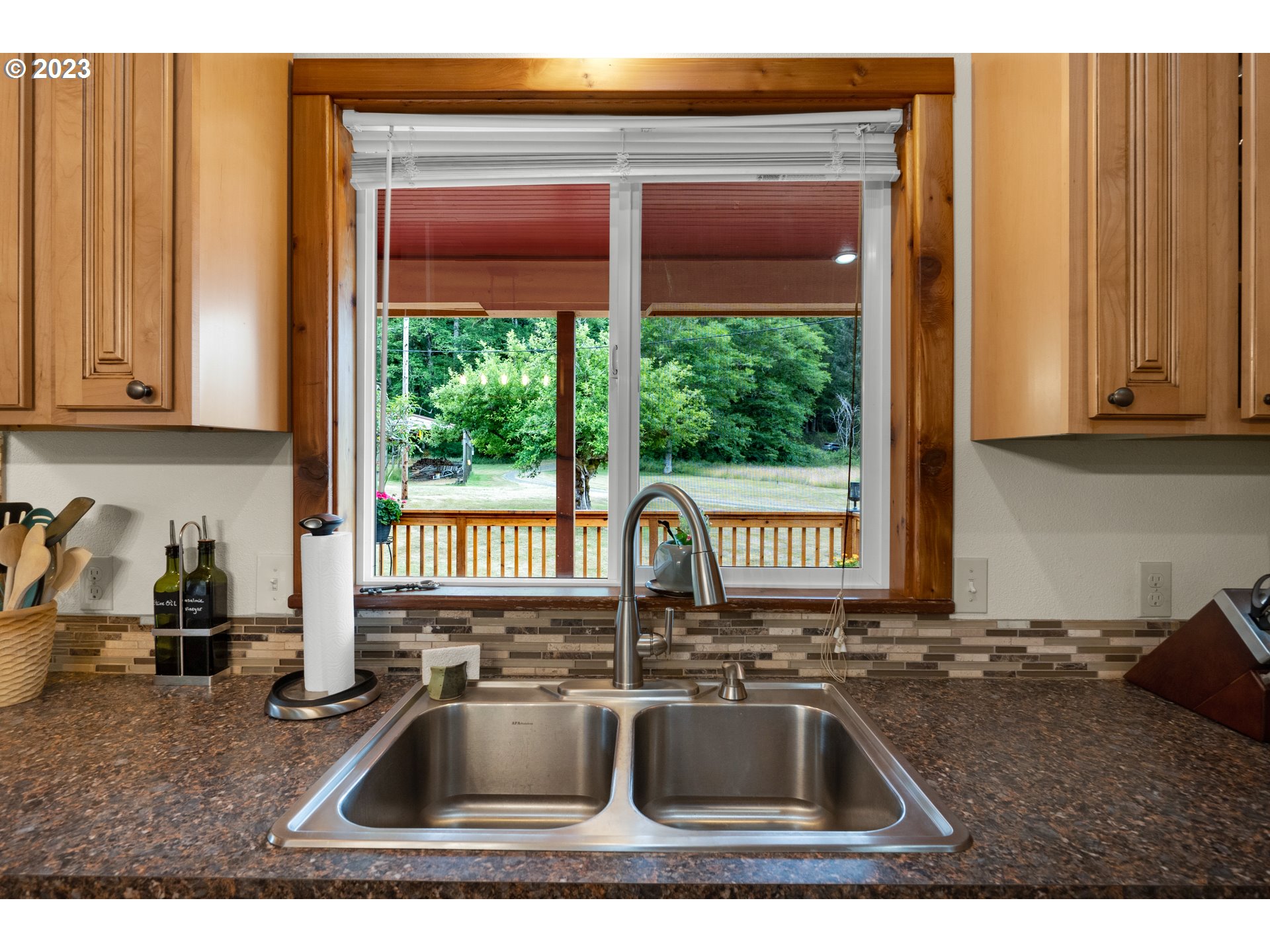 92357 Maki Road Astoria, OR 97103 - Photo 12 of 41 a kitchen with sink refrigerator and window