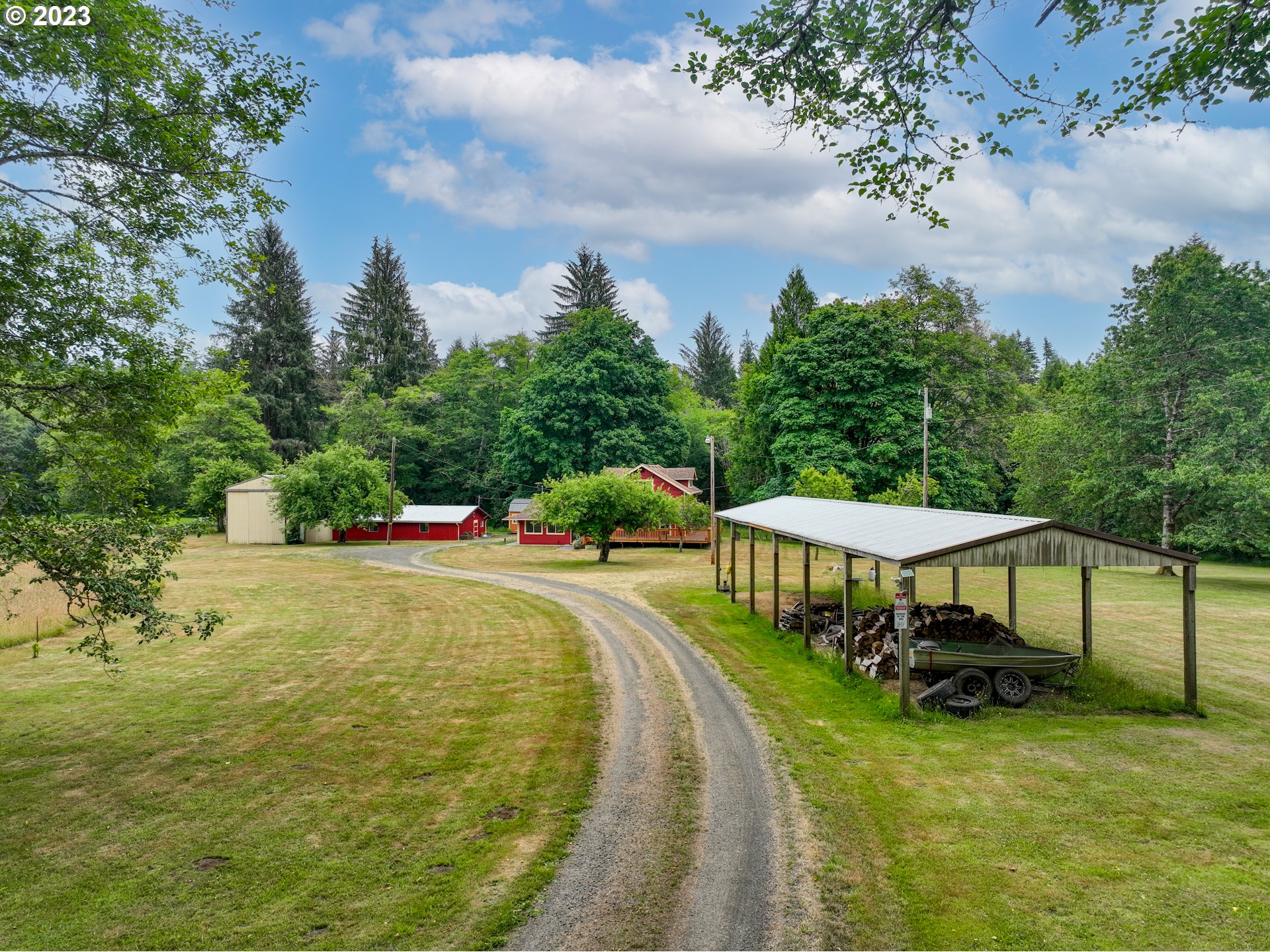 92357 Maki Road Astoria, OR 97103 - Photo 40 of 41 a view of a swimming pool with a garden