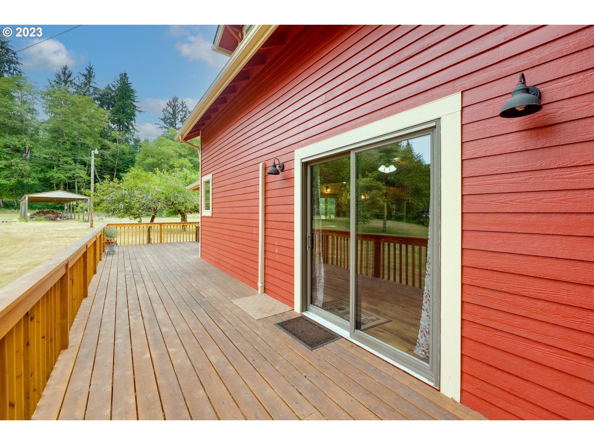 92357 Maki Road Astoria, OR 97103 - Photo 4 of 41 a view of backyard with a deck