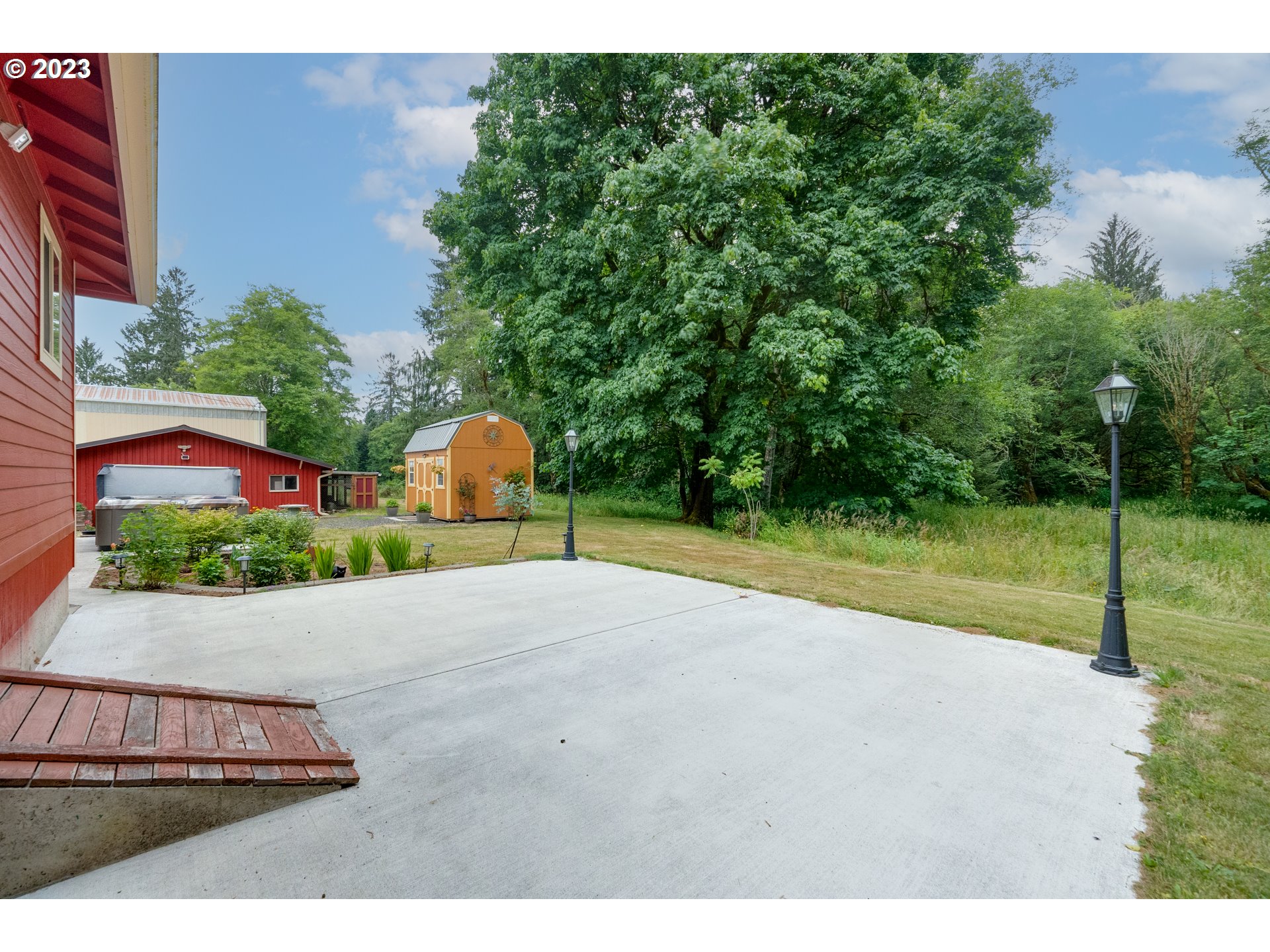 92357 Maki Road Astoria, OR 97103 - Photo 7 of 41 a view of a garden with potted plants