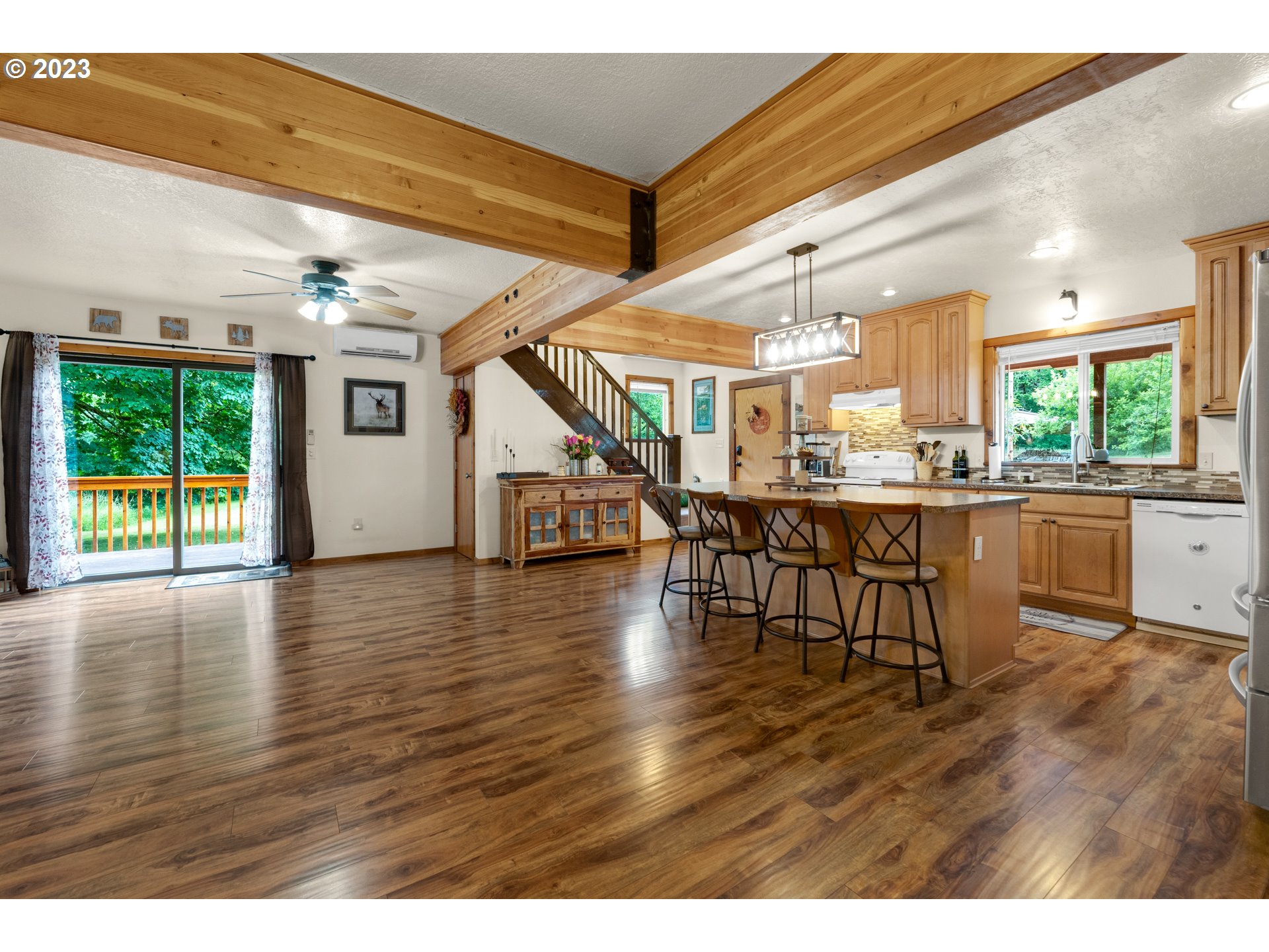92357 Maki Road Astoria, OR 97103 - Photo 9 of 41 a view of a dining room with furniture window and wooden floor