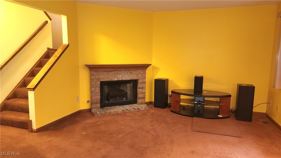 15446 Roxboro Drive Cleveland, OH 44130 - Photo 8 of 20 Living room with fireplace