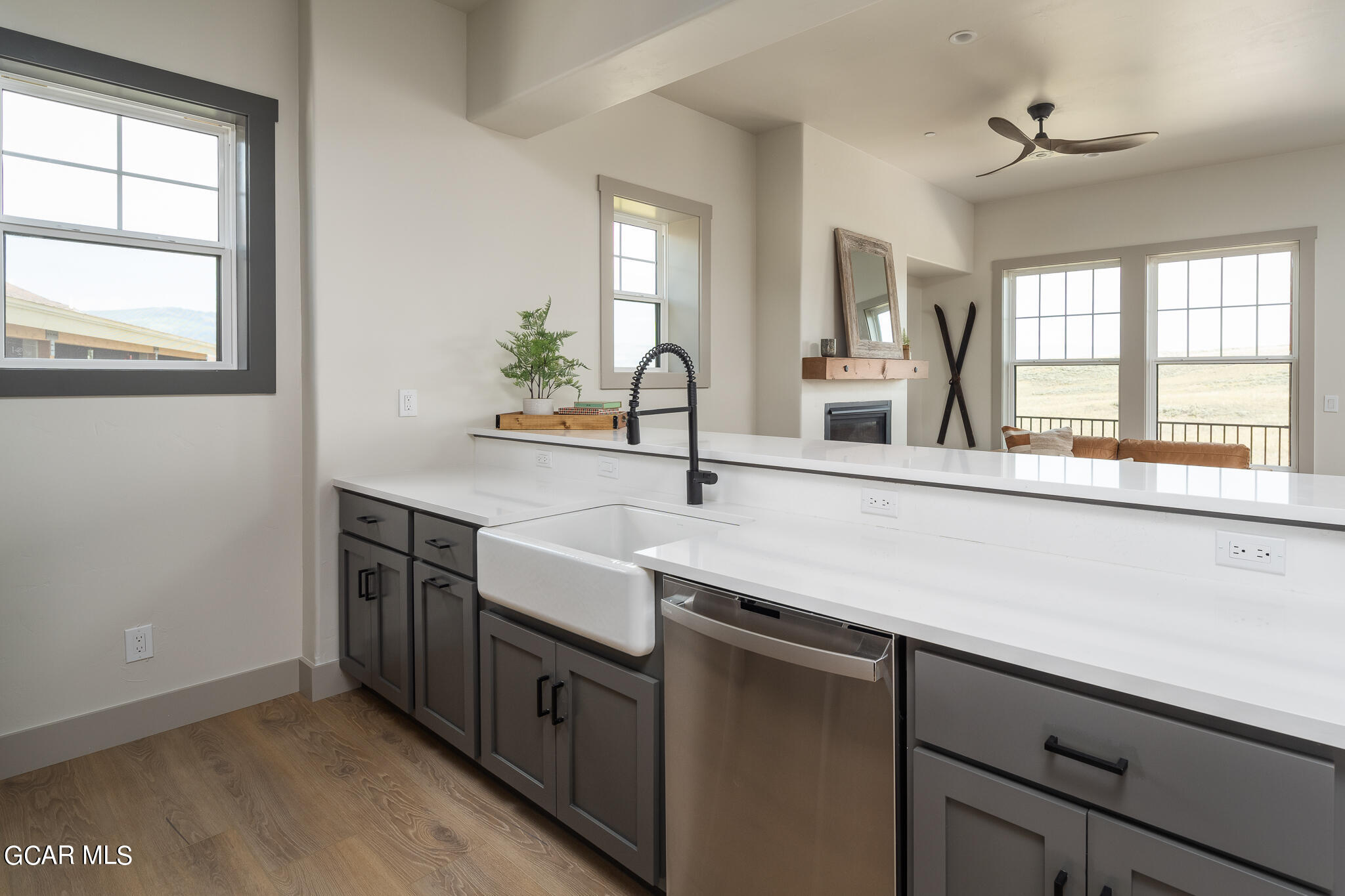 219 Eagle Ridge Circle Granby, CO 80446 - Photo 14 of 41 a kitchen with stainless steel appliances granite countertop a sink and a large window