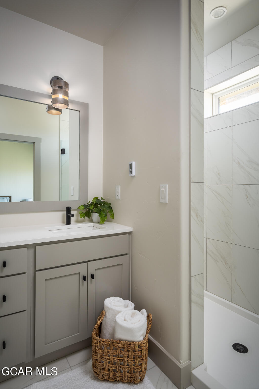 219 Eagle Ridge Circle Granby, CO 80446 - Photo 24 of 41 a bathroom with a toilet a sink and mirror
