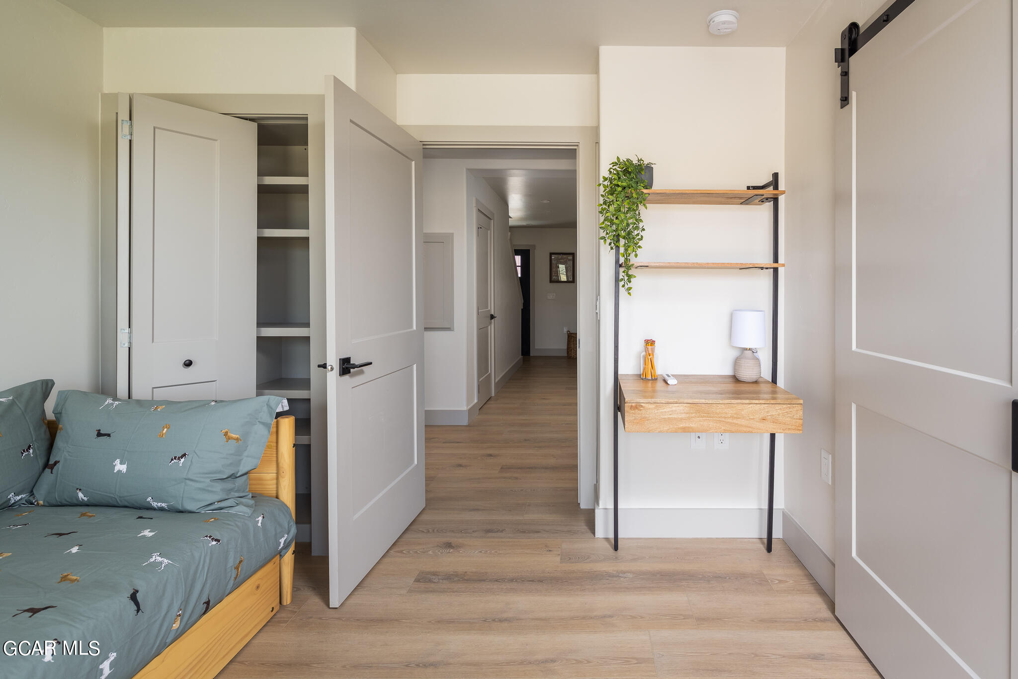 219 Eagle Ridge Circle Granby, CO 80446 - Photo 30 of 41 a view of walk in closet and bedroom