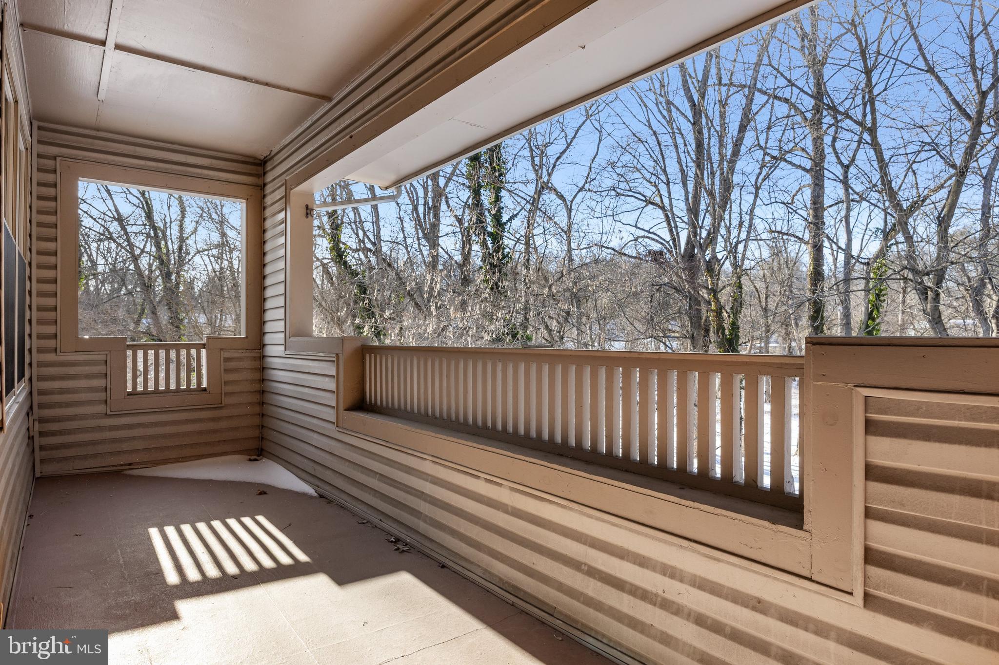 321 Tavistock Road Cherry Hill, NJ 08034 - Photo 20 of 25 a view of a balcony with wooden floor