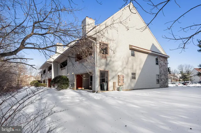 a view of a building with a snow