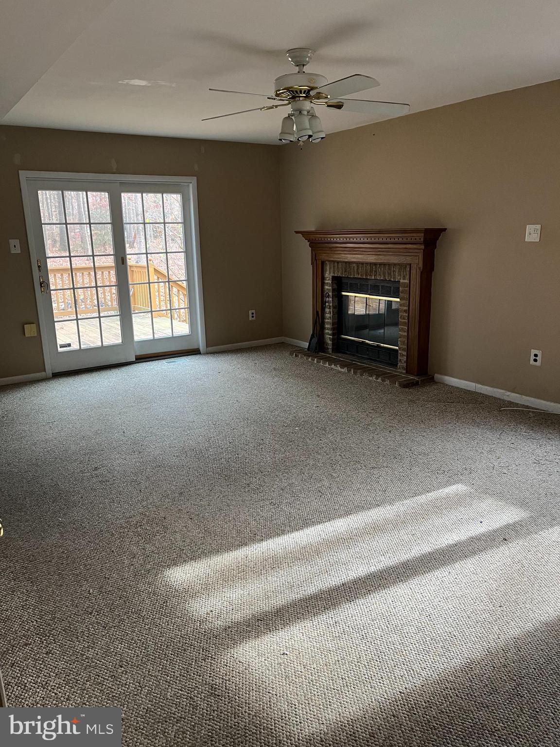 221 Irick Road Westampton, NJ 08060 - Photo 2 of 6 a view of empty room with a fireplace