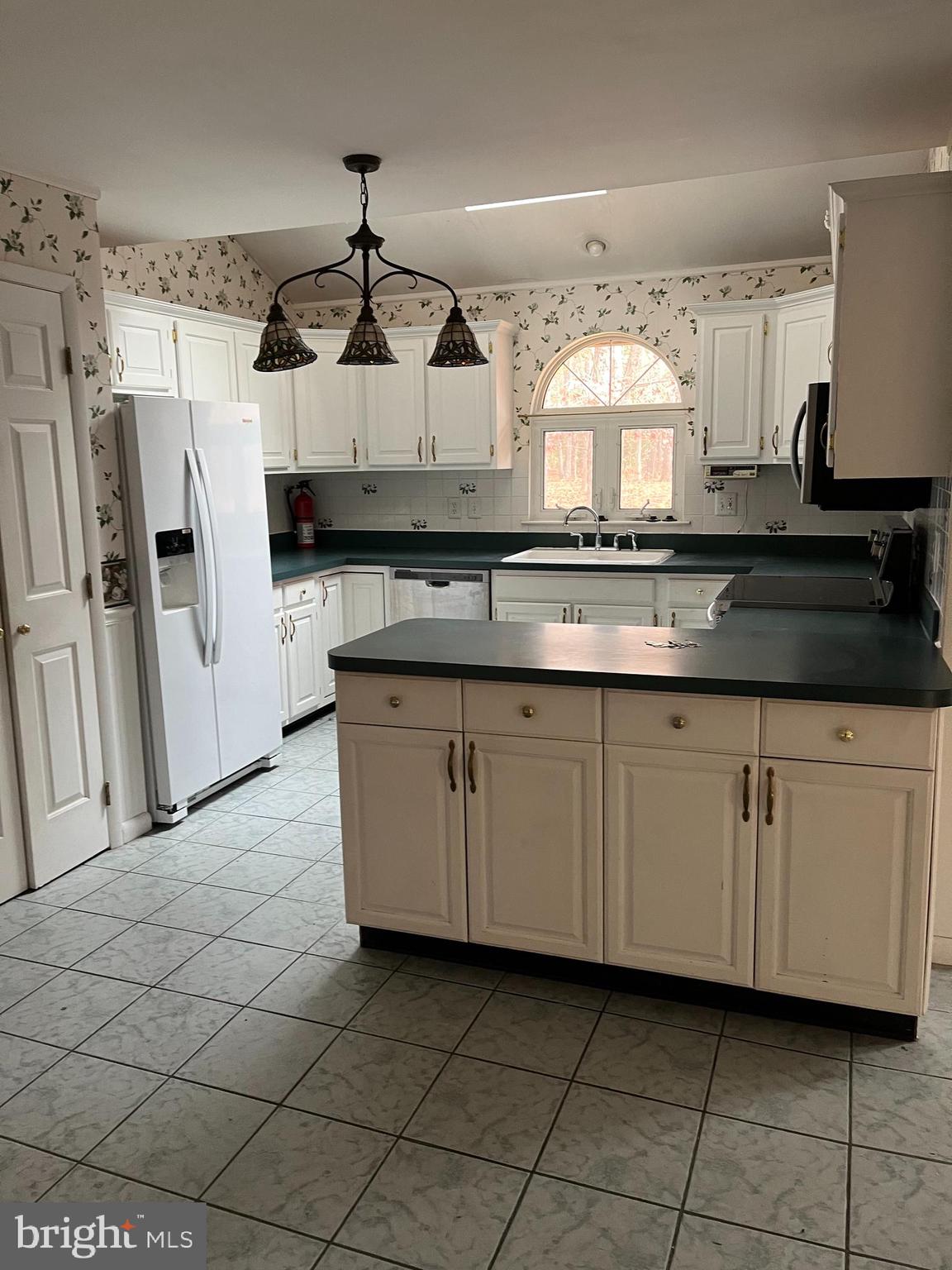 221 Irick Road Westampton, NJ 08060 - Photo 5 of 6 a kitchen with cabinets and a stove