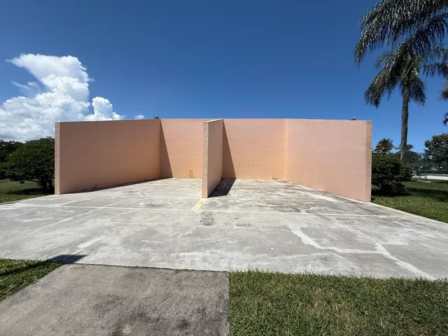 a outdoor space with patio lots of furniture and umbrella