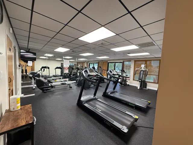 a view of a room with gym equipment