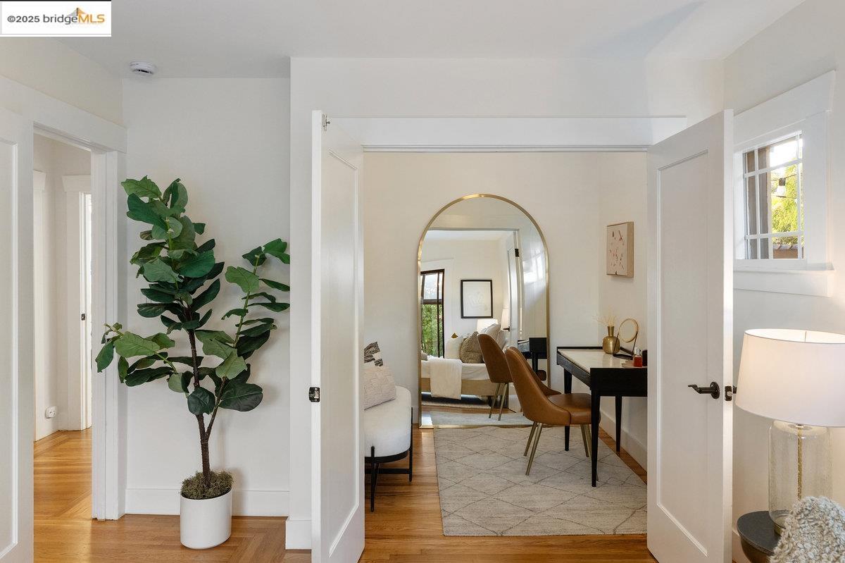 3056 California Street Oakland, CA 94602 - Photo 22 of 44 Corridor featuring light wood-type flooring and a desk