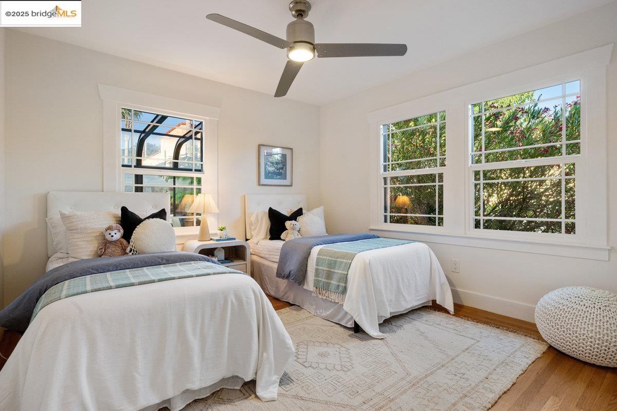 3056 California Street Oakland, CA 94602 - Photo 29 of 44 Bedroom featuring wood finished floors and a ceiling fan