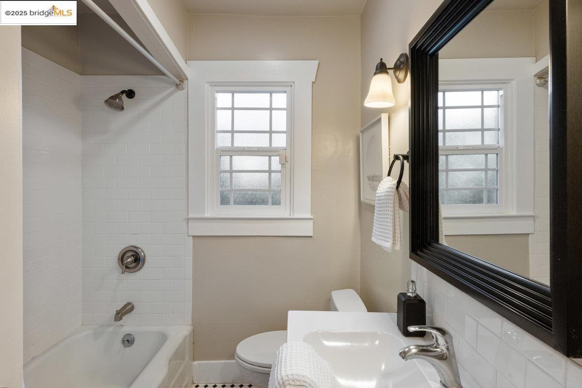 3056 California Street Oakland, CA 94602 - Photo 30 of 44 Bathroom featuring shower / bathtub combination and plenty of natural light