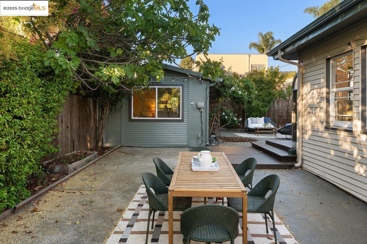 3056 California Street Oakland, CA 94602 - Photo 32 of 44 View of patio featuring a wooden deck and outdoor dining area