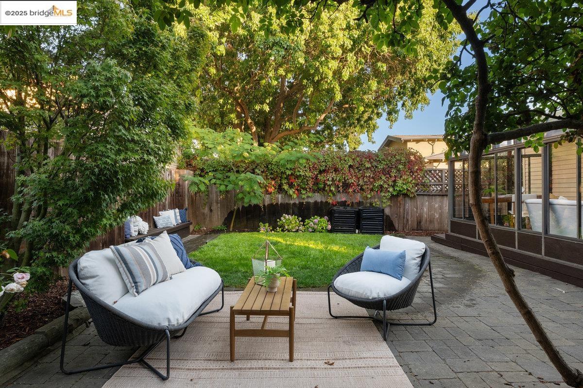3056 California Street Oakland, CA 94602 - Photo 40 of 44 Fenced backyard featuring a patio and an outdoor living space