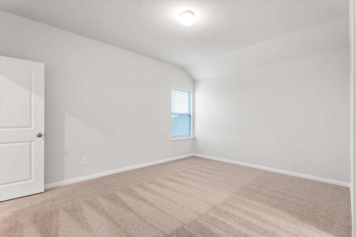 320 Windstar Road Liberty Hill, TX 78642 - Photo 22 of 29 wooden floor in an empty room