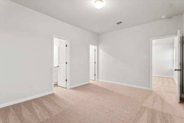 an empty room with an entryway