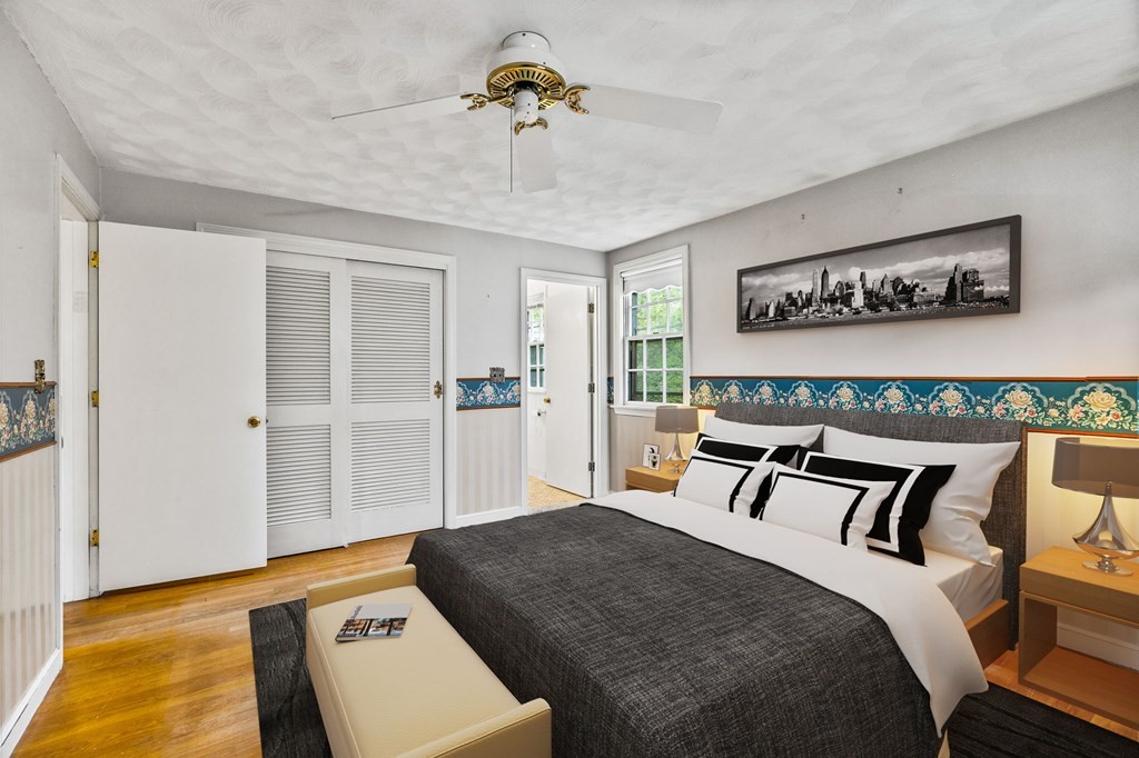 10 Old Coach Road Canton, MA 02021 - Photo 21 of 42 a spacious bedroom with a bed and glass door