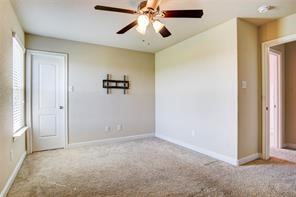 2723 Intrepid Trail Rosenberg, TX 77471 - Photo 23 of 30 Secondary Bedroom #2 features a walk-in closet.