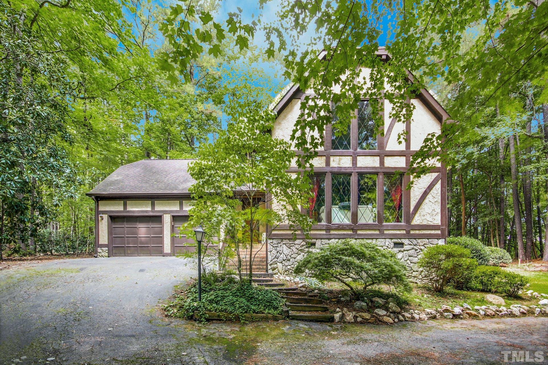 8841 Woodyhill Road Raleigh, NC 27613 - Photo 1 of 21