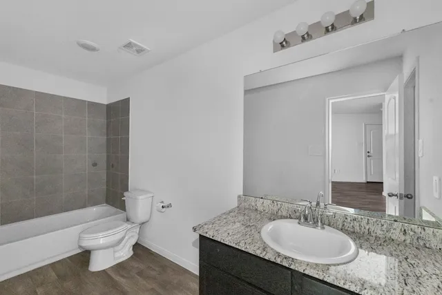 a bathroom with a sink and a toilet
